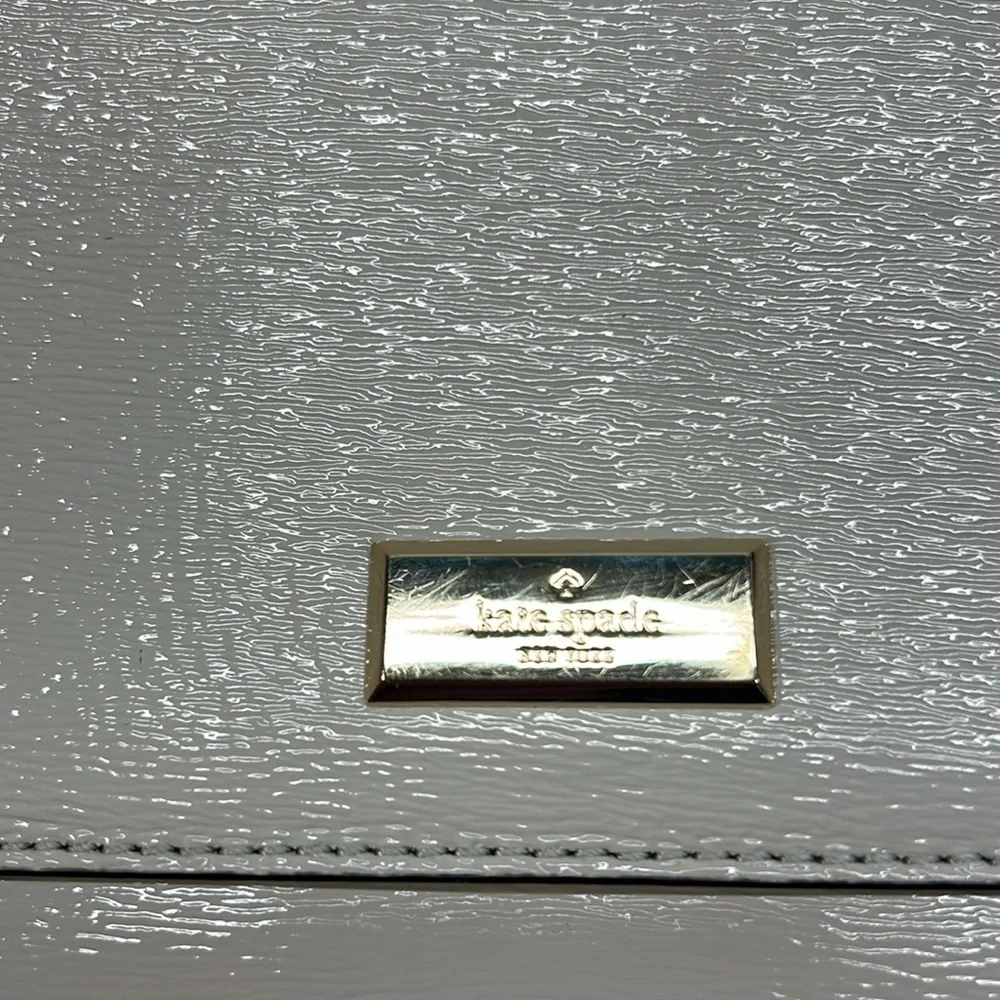 Kate Spade gray crossbody with gold chain